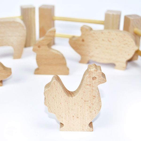 Дерев'яний ігровий набір "Фігурки тварин" Igroteco 900521, 17 деталей 900521 фото